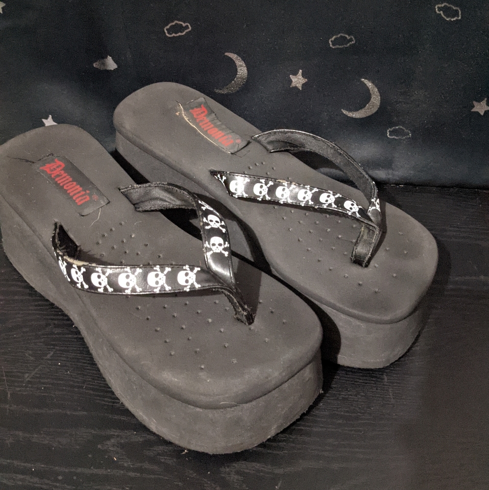 Demonia platform skull flip flops